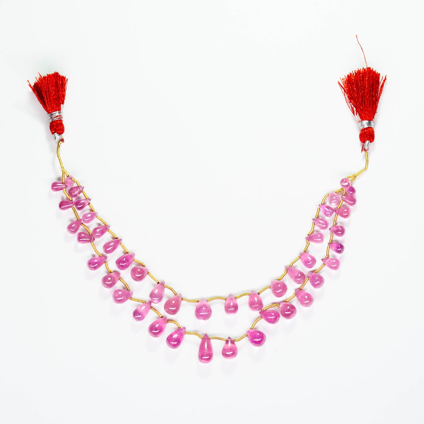 Glass Filled Ruby Drops 2 Lines 84.5 carat