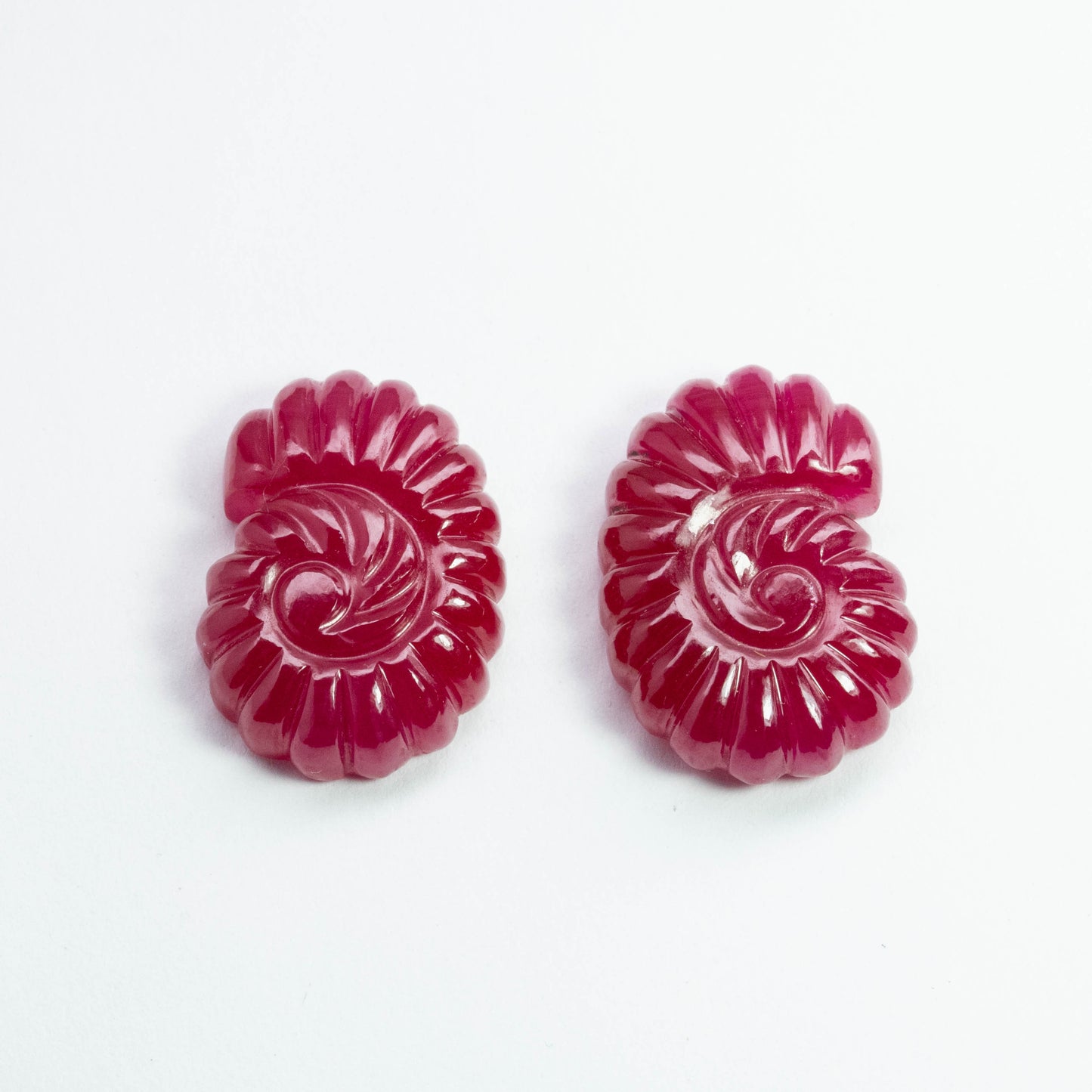 Red Opaque Carving 2 pieces 73.7 carat