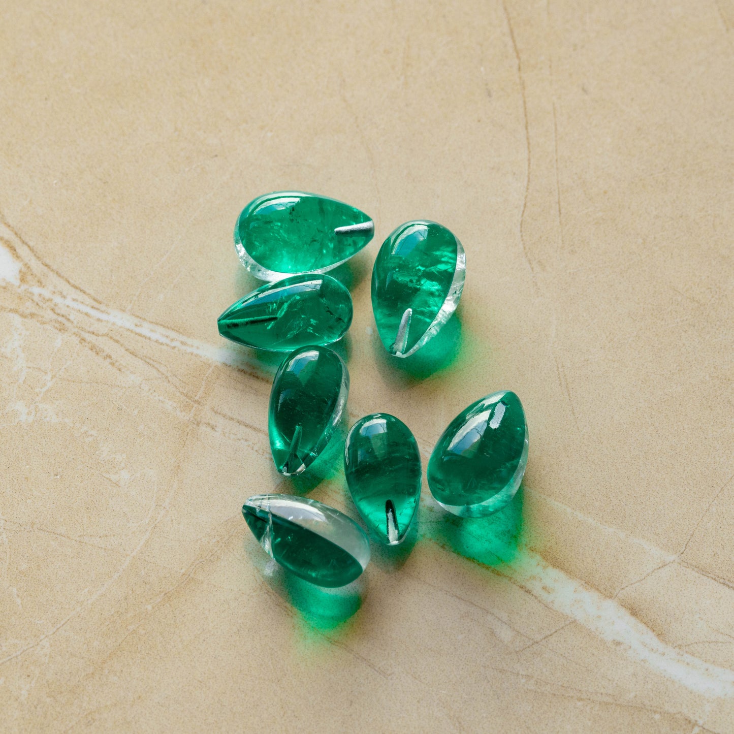 Green Doublet Drops 7 piece 75.6 carats