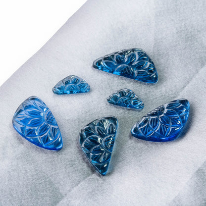 Blue Synthetic Carving 6 pieces 57.35 carat