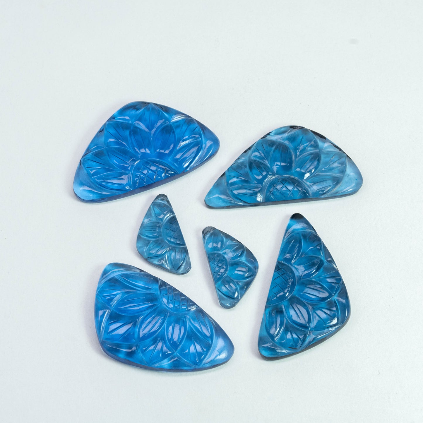 Blue Synthetic Carving 6 pieces 57.35 carat